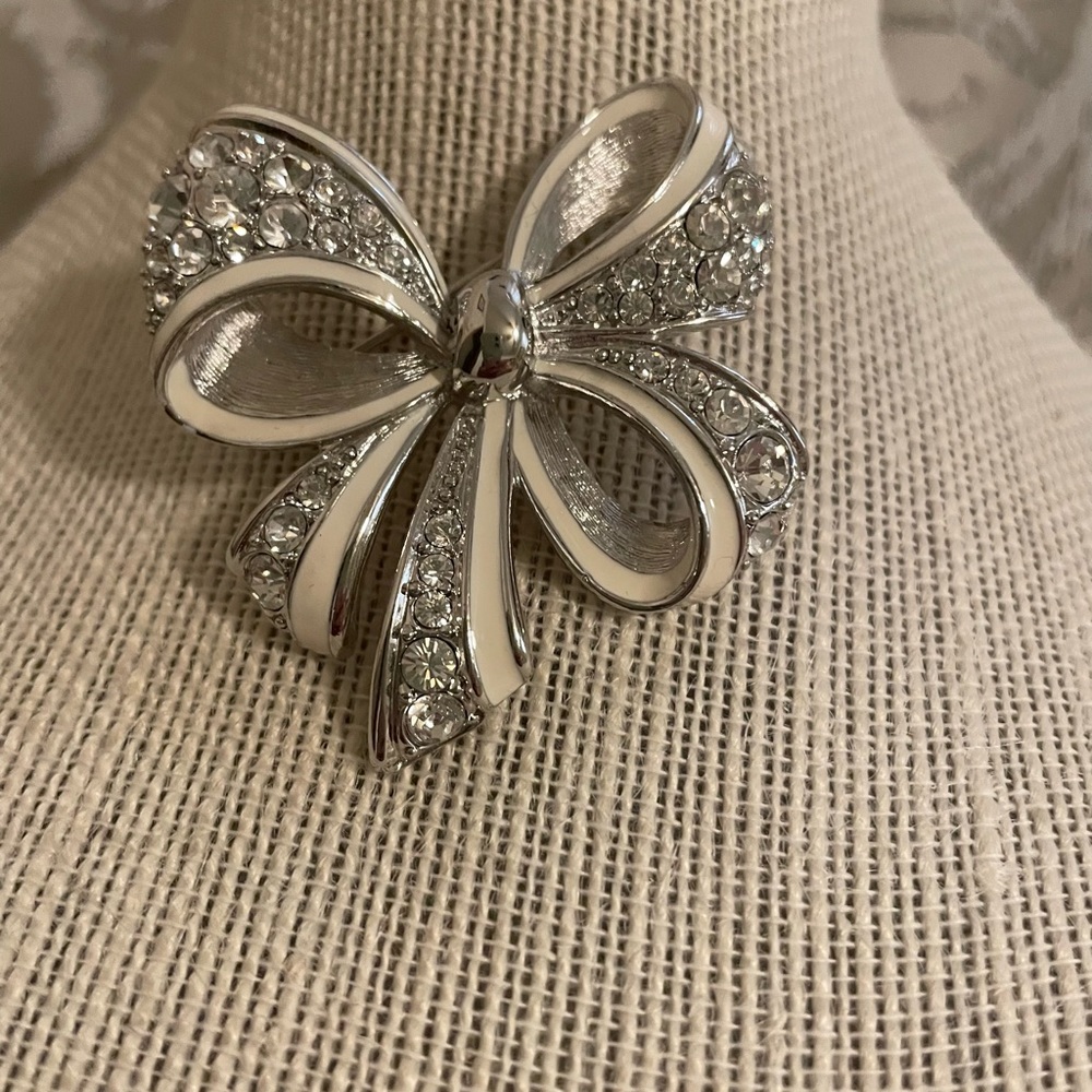 Nolan Miller crystal bow brooch